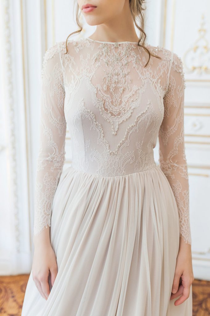 Nude wedding gown with tiered skirt and crystal embroidery | Cathy Telle