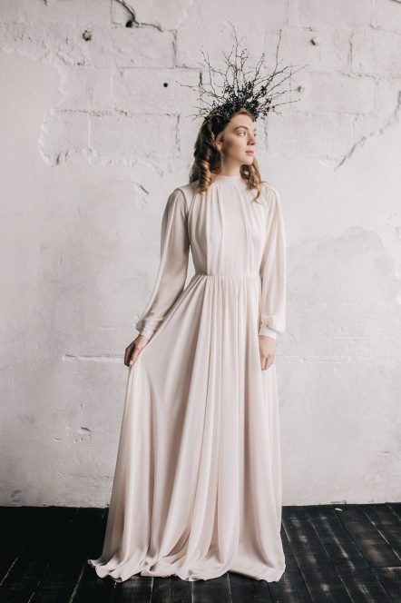 Nude bishop sleeve wedding dress