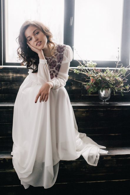 Off-white wedding dress with long sleeve