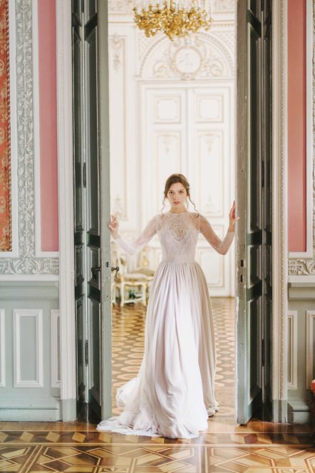 Nude wedding gown with tiered skirt