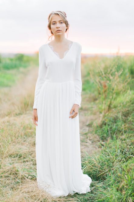 Off-white long sleeve wedding dress