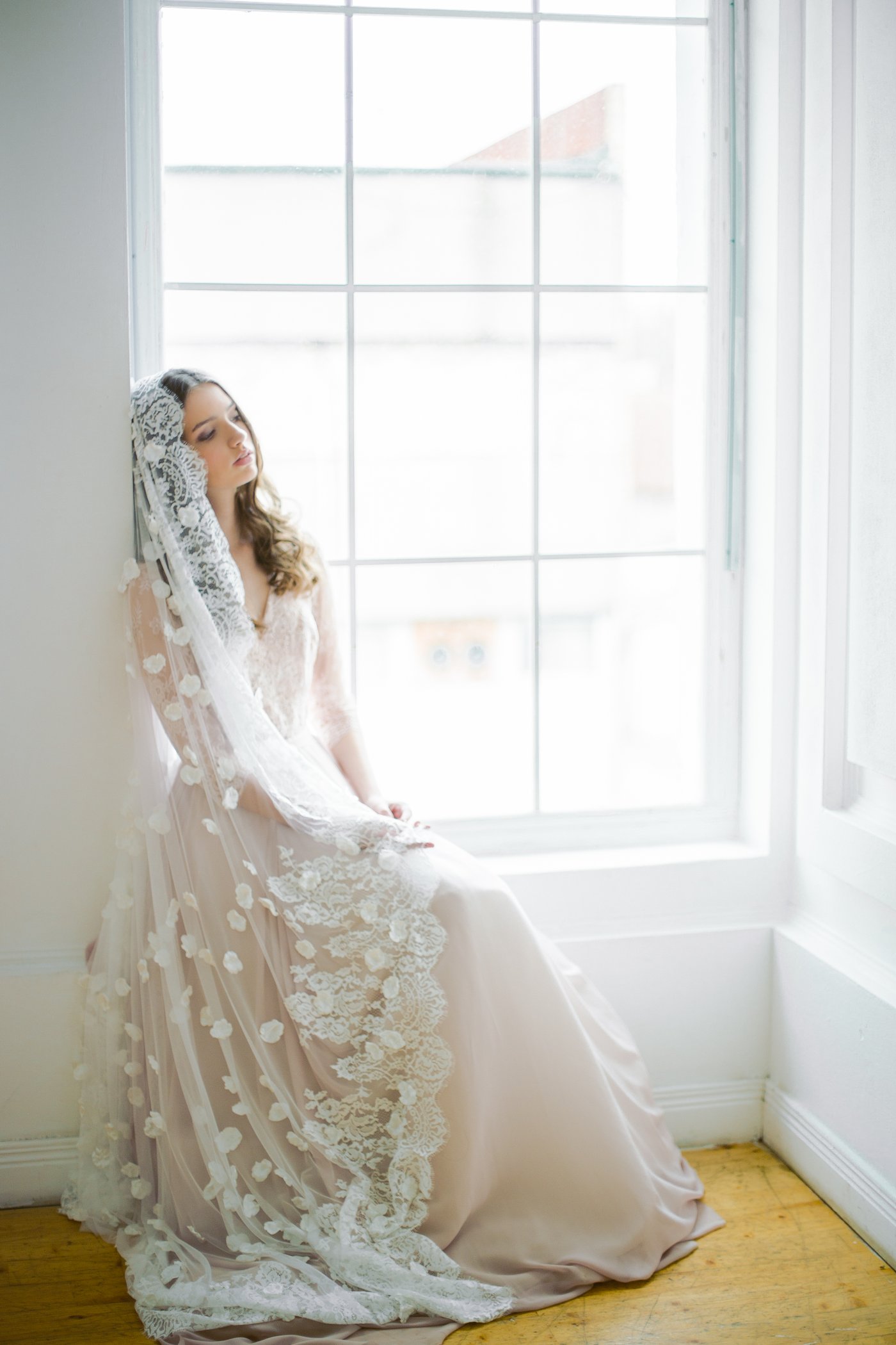 Light blue two tier cathedral veil with hand-sewn textile petals and  crystals