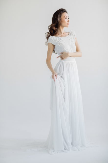 Cap sleeve wedding dress with open back