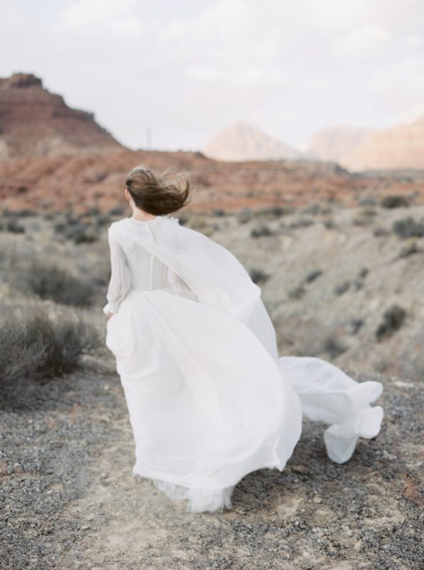 Off-white cape wedding gown