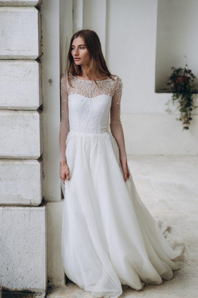Off-white wedding dress with sheer long sleeve embroidered bodice ...