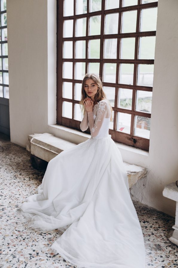 Off-white wedding dress with long sleeve